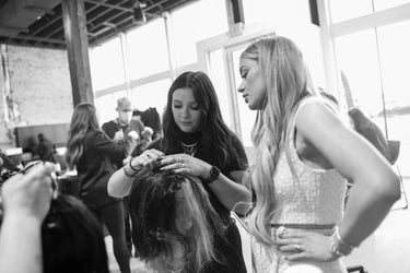Harper Ellis Instructor with student in workshop